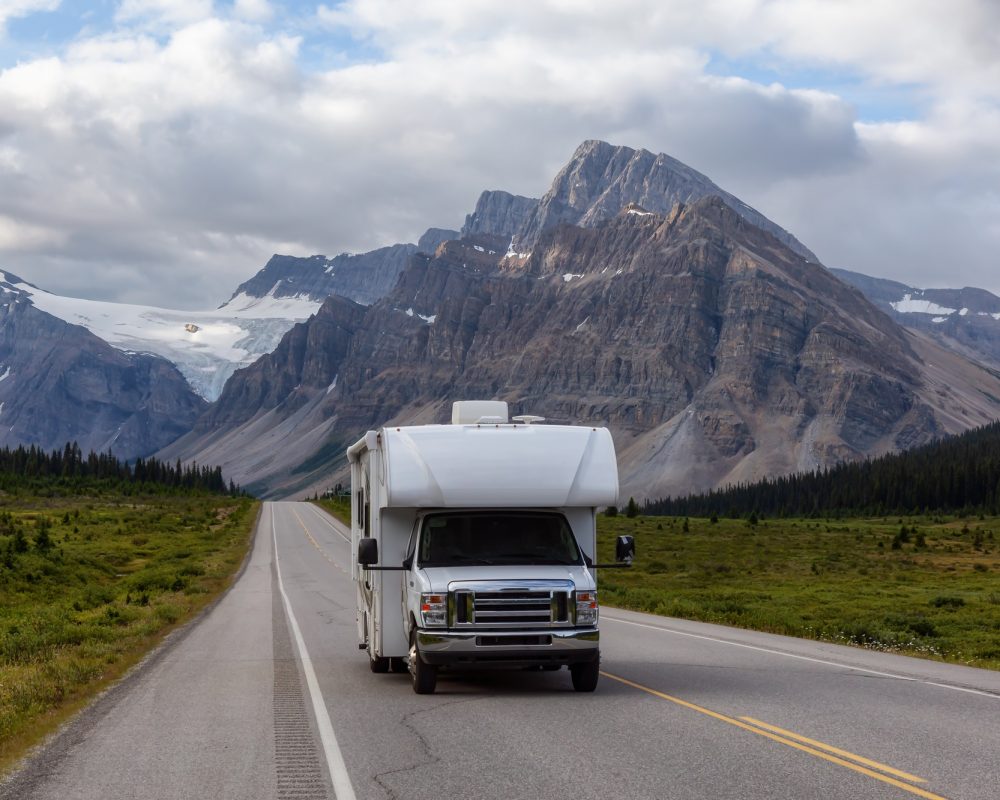 camper-van-driving-on-a-scenic-road-in-the-canadian-rockies
